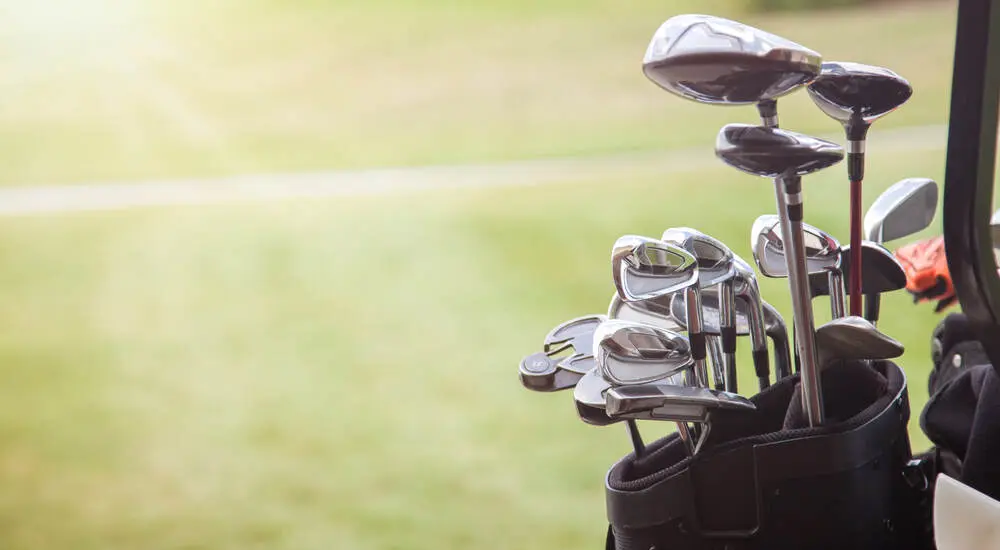 Golf Clubs Overlooking The Green types of golf bags